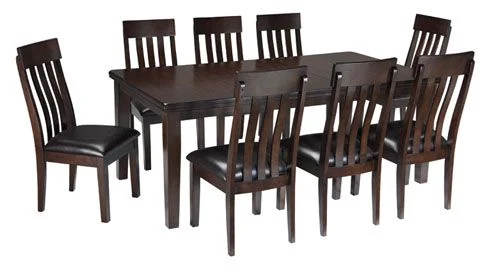 The 5 piece Haddigan Dining Set from Ashley Furniture offers simplicity at its finest with a traditional dining table made from select oak veneers and hardwood solids, complimented by a dry smoky dark brown finish. 